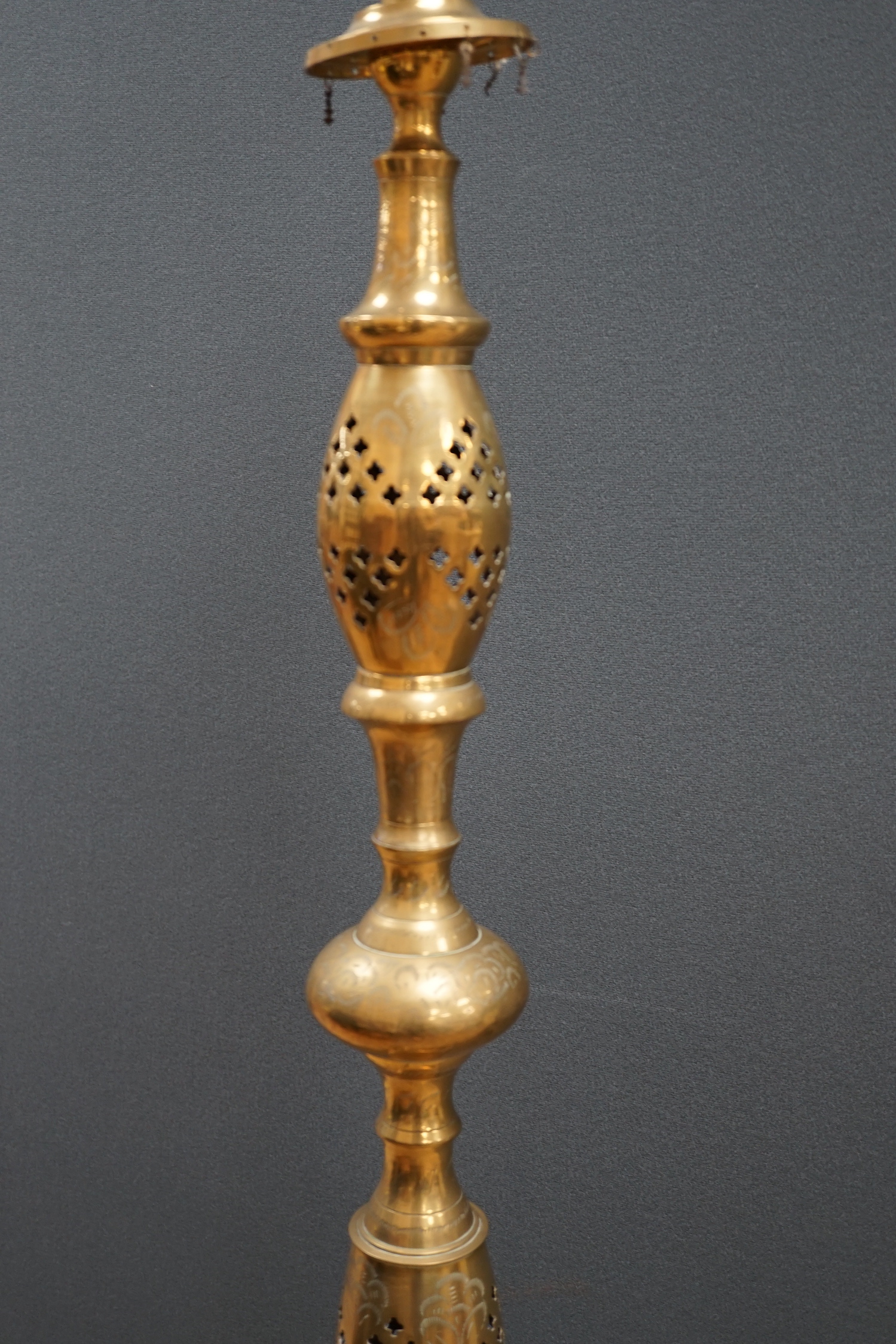 A large Middle Eastern brass hookah, 154cm